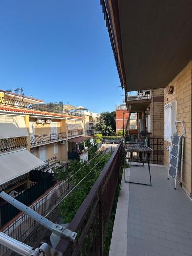 a balcony of a building with a garden at Hotel Ristorante Centosedici in Terracina