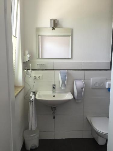 Koupelna v ubytování Hotel 37