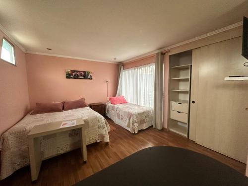 Postel nebo postele na pokoji v ubytování Apart Hotel Colors