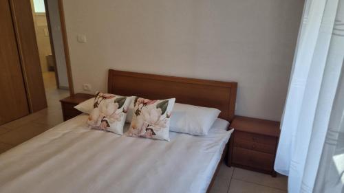 Ένα ή περισσότερα κρεβάτια σε δωμάτιο στο Apartma Danica