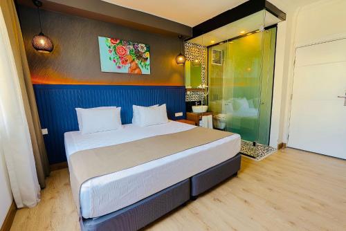 Кровать или кровати в номере Casativo Hotel