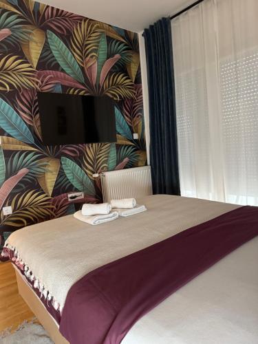 Voodi või voodid majutusasutuse Ria apartman toas