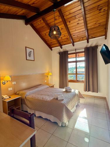 Ένα ή περισσότερα κρεβάτια σε δωμάτιο στο Azul Hotel & Spa
