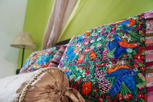 Ένα ή περισσότερα κρεβάτια σε δωμάτιο στο Hostal Antigüeño