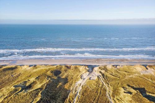 an aerial view of a beach and the ocean at 172-Ringkobing-Magedalen-34 in Ringkøbing