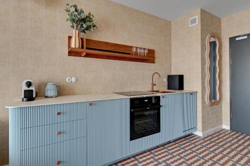 Blue Mandarin Portovo - Apartments near Marina & Amber Sky