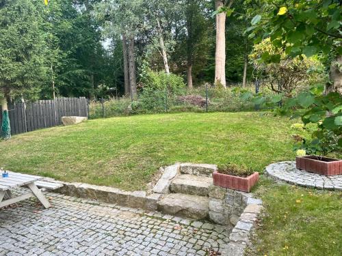 Taman di luar Dom Białka Zdrój