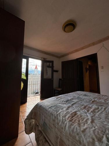 Katil atau katil-katil dalam bilik di Casa Colonial San Felipe