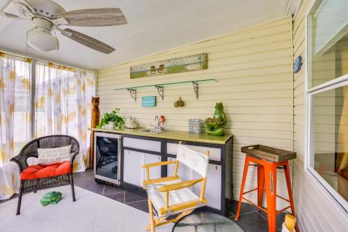 a kitchen with a sink and a stove at Home with Lanai 10 Mi to Beach and Old Naples! in Naples