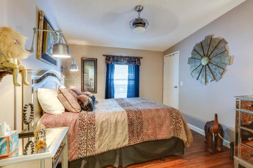 a bedroom with a bed and a window at Home with Lanai 10 Mi to Beach and Old Naples! in Naples
