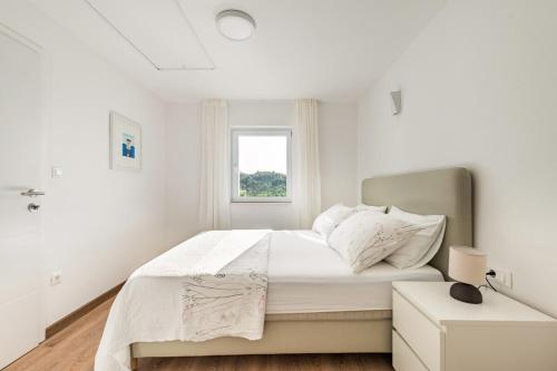 Postel nebo postele na pokoji v ubytování Holiday house ISA