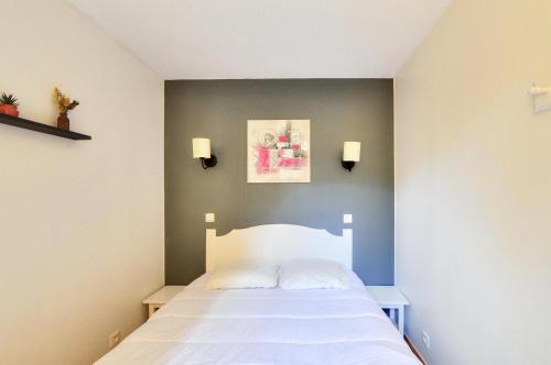 Postel nebo postele na pokoji v ubytování La résidence du Lac - maeva Home - Appartement 2 pièces 4 personnes - Prestige MAE-5513