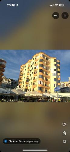 a picture of a large building in a city at Balcony on the sea in Durrës