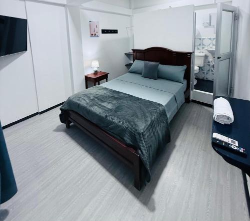 Postel nebo postele na pokoji v ubytování Hostal Elizabeth