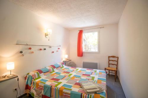 Postel nebo postele na pokoji v ubytování Serra-di-ferro Corse