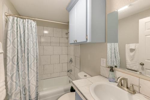 a white bathroom with a sink and a toilet at Private Yard: Pet-Friendly Studio in New Boston! in New Boston
