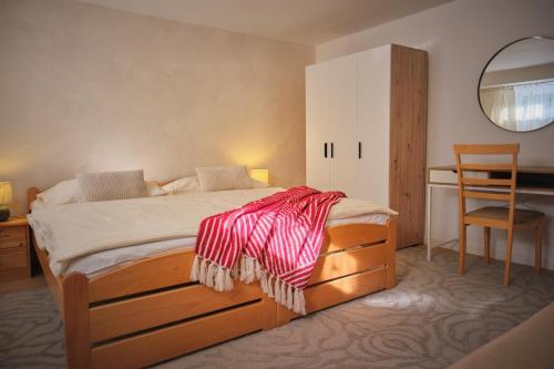 Ένα ή περισσότερα κρεβάτια σε δωμάτιο στο vila Barbara - Vysoké Tatry