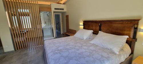 Ένα ή περισσότερα κρεβάτια σε δωμάτιο στο B&B Villa Dina