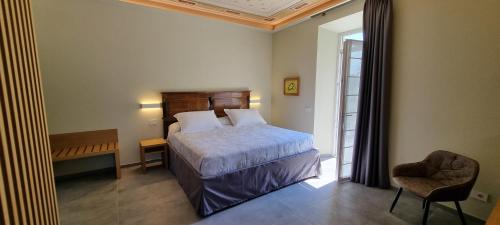 Ένα ή περισσότερα κρεβάτια σε δωμάτιο στο B&B Villa Dina