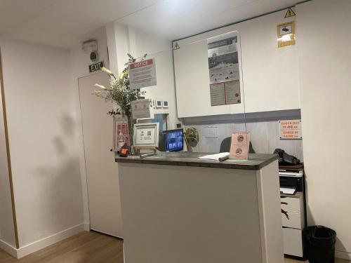 Dapur atau dapur kecil di Hostal la Palmera