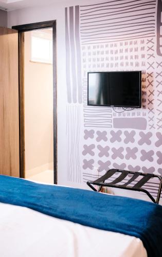 TV a/nebo společenská místnost v ubytování B Hotel Salvador