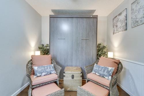 a room with two chairs and a door at 2 Mi to Dtwn Forest Grove Quiet Studio with Yard in Forest Grove