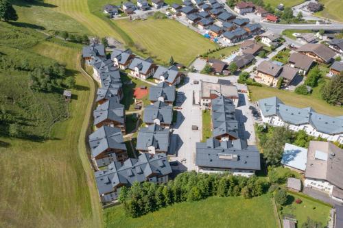 an aerial view of a residential estate at Andrea 1 by SMR Rauris Apartments inc SPA and near Gondola in Rauris