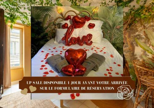 a poster of a bed with a heart made out of books at L'aventurier - Jacuzzi Lounge & Massage in Vierzon