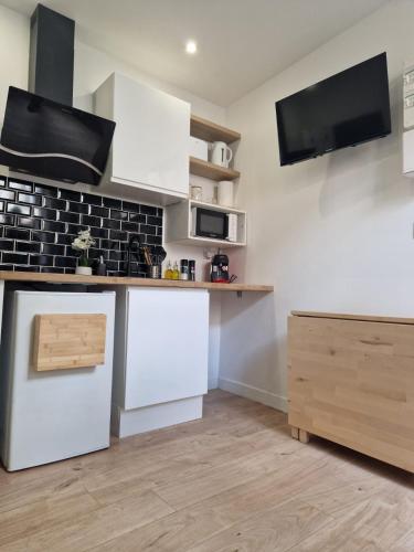 Photo de la galerie de l'établissement Cozy Nook in Vincennes with Private Terrace, à Vincennes