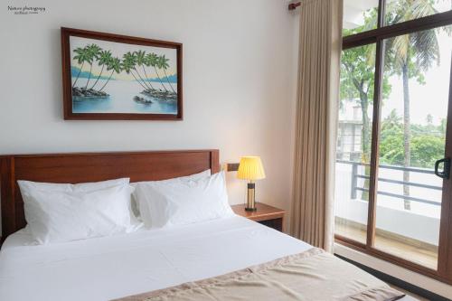 Ein Bett oder Betten in einem Zimmer der Unterkunft Oasis of Tranquility