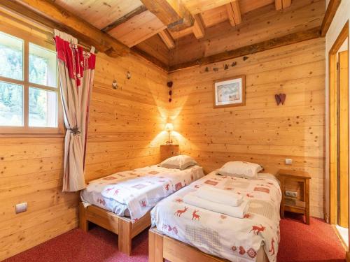 Ένα ή περισσότερα κρεβάτια σε δωμάτιο στο Casa-Chalet Brizolée avec vue sur le lac à Tignes