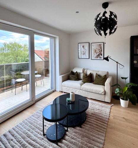 Moderne Ruheoase mit Balkon