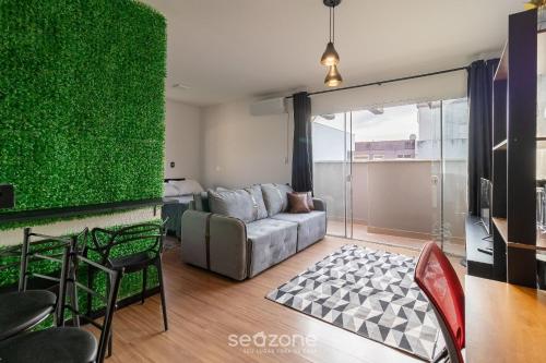 Ένα ή περισσότερα κρεβάτια σε δωμάτιο στο Aptos completos a 600m do Parque de Coqueiros - DAC