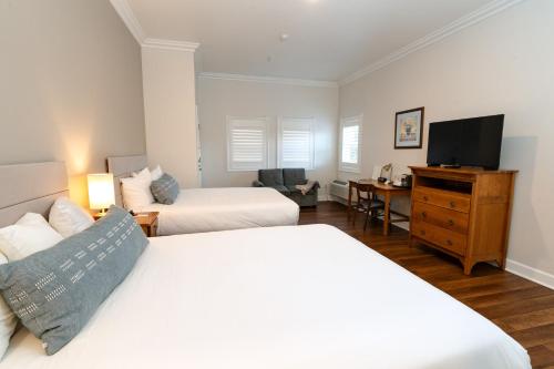 Ένα ή περισσότερα κρεβάτια σε δωμάτιο στο Elm House Inn