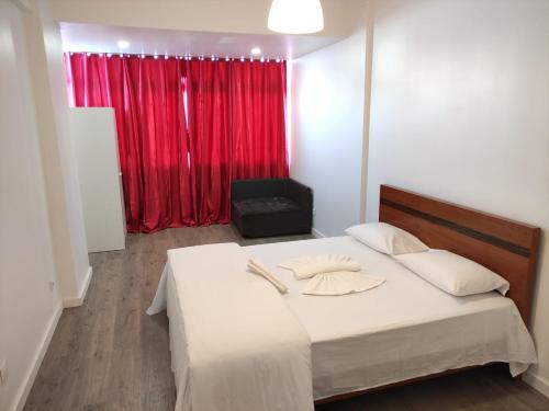 Ένα ή περισσότερα κρεβάτια σε δωμάτιο στο Relax Guest House