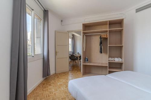 Postel nebo postele na pokoji v ubytování AB Sagrada Familia Views