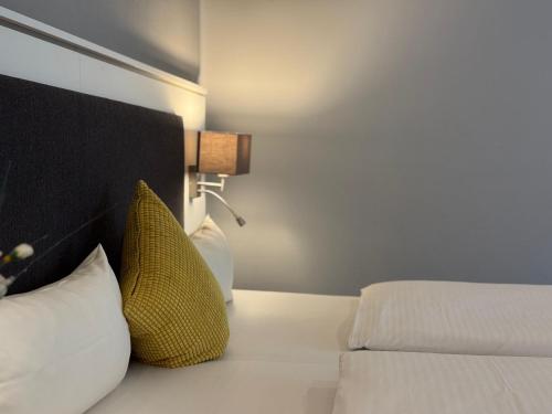 Mirage City Hotel Stuttgart Zentrumにあるベッド