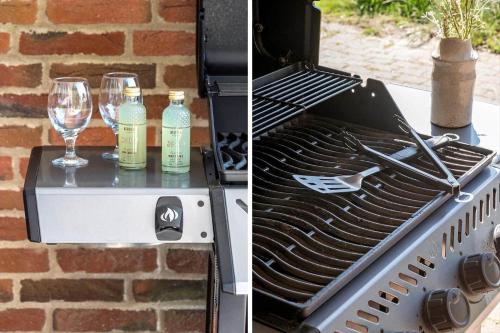 a grill with two glasses and two bottles of wine at 1126-Ringkobing-Frans-Julius-Vej-44 in Ringkøbing
