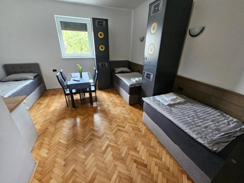Postel nebo postele na pokoji v ubytování ArtRock Residence