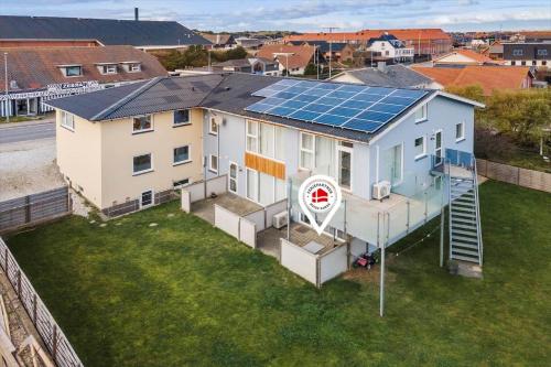 an image of a house with solar panels on the roof at 769-Hvide-Sande-Norregade-4-C in Hvide Sande