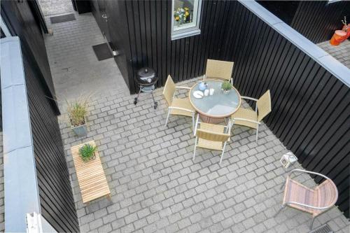 an overhead view of a patio with a table and chairs at 717-Hvide-Sande-Slusen-17 in Hvide Sande