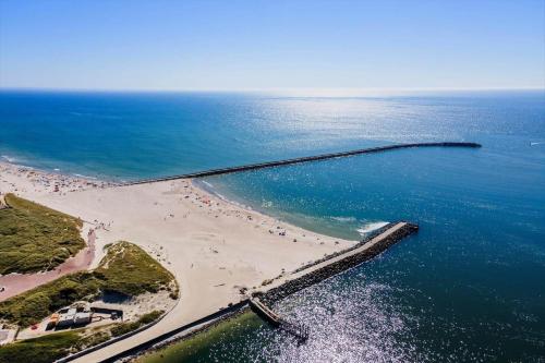 an aerial view of a beach and the ocean at 717-Hvide-Sande-Slusen-17 in Hvide Sande