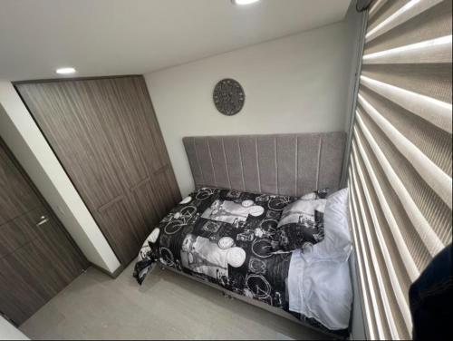 Ένα ή περισσότερα κρεβάτια σε δωμάτιο στο Apartamento amoblado, Edificio Avanzzare T1-601,