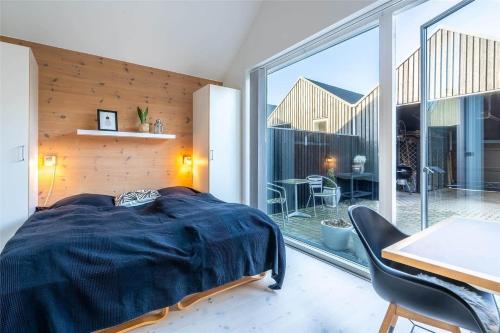 Postel nebo postele na pokoji v ubytování 752-Hvide-Sande-Slusen-52