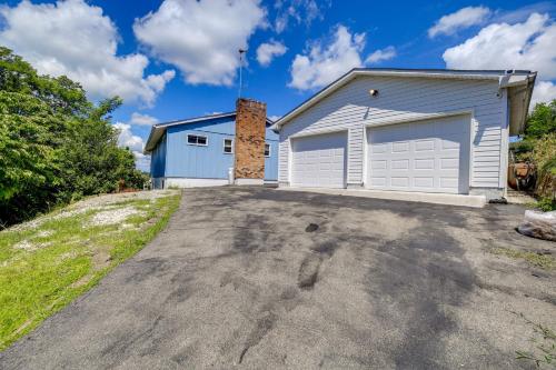 a house with a garage on top of a driveway at Lake Views and Private Dock Radford Retreat! in Radford