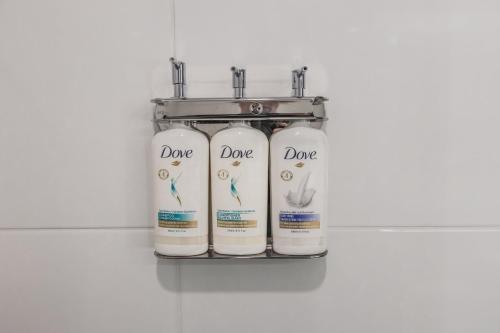 a group of three white gas cylinders on a shelf at Holiday Inn Express Toronto-North York by IHG in Toronto