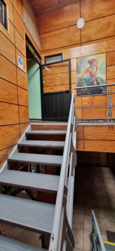 an interior view of a rv with stairs in it at Hotel Fish in Concepción
