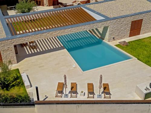 Kolam renang di atau dekat dengan Benedicta A luxury villa with a pool, spa area, and complete privacy