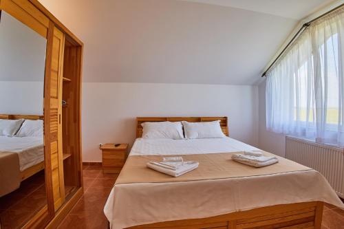 Ένα ή περισσότερα κρεβάτια σε δωμάτιο στο Casa Siaj