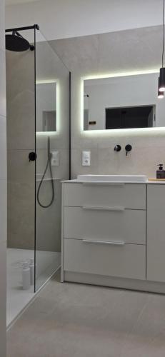 Koupelna v ubytování Apartament Giżycko Studio 51 z widokiem na park